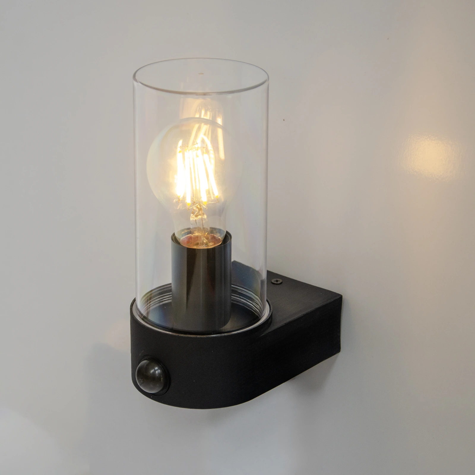 GD-PW050 · black housing · light-on view